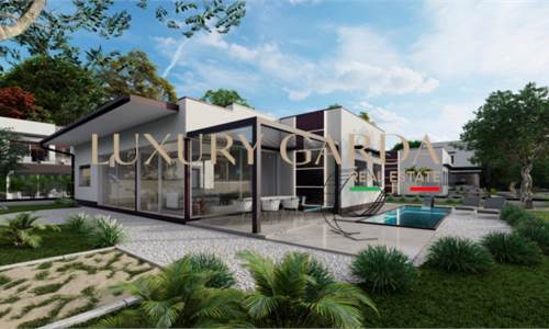 Современная вилла на озере Гарда с частным садом